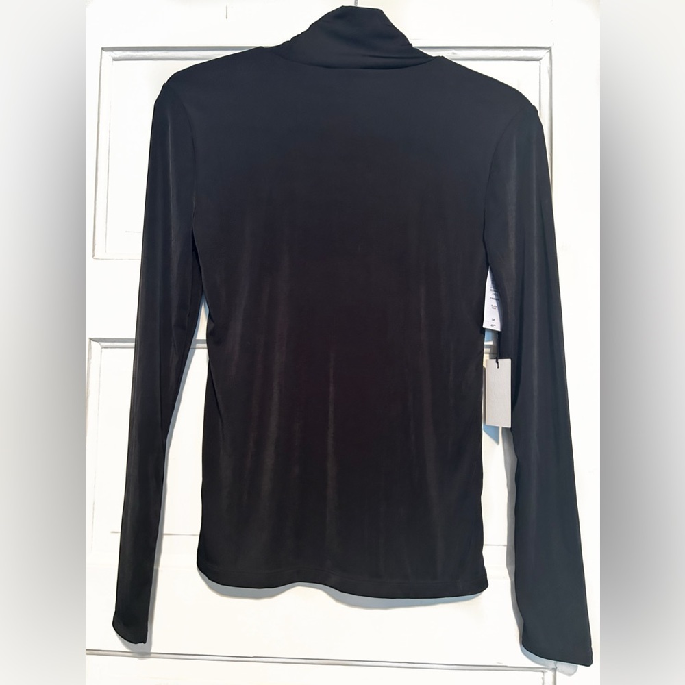 Brand new Aritzia Canary turtleneck. Size Small.
